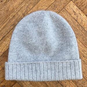 Uniqlo grey cashmere beanie with a few tiny holes